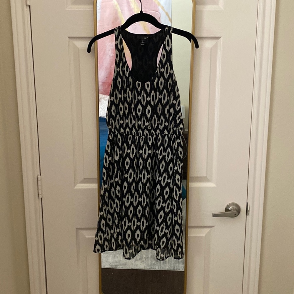 Cute black and white racer back dress.